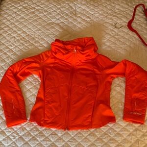 Lululemon size 10 push your pace jacket size 10 Orange Jacket.  Never worn!